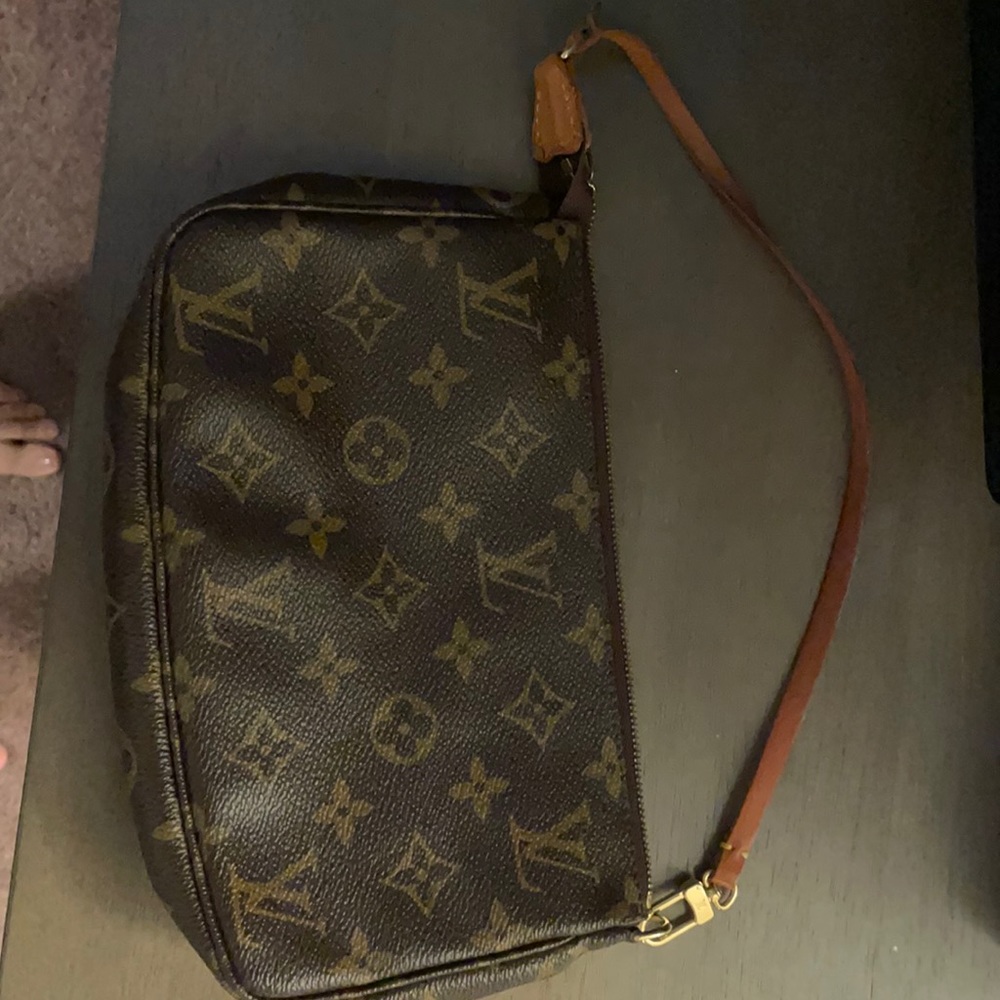 Authentic Louis Vuitton Porschette.